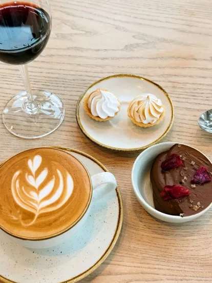 Red wine, coffee, small tarts and chocolate mousse